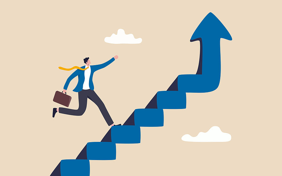 businessman climbing stairs to success